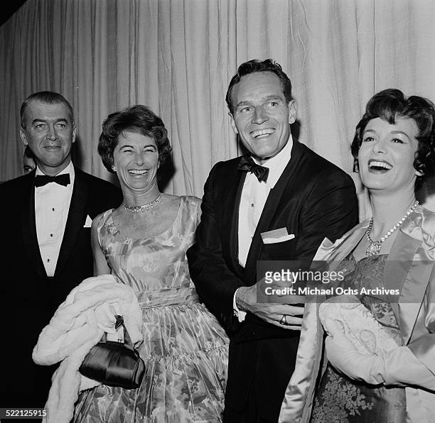 Actor James Stewart with his wife Gloria, actor Charlton Heston and his wife Lydia Clarke attend an event in Los Angeles,CA.