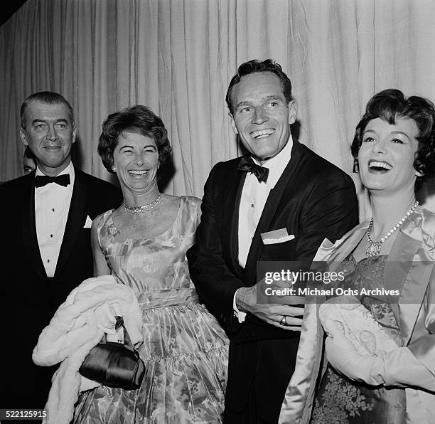 Actor James Stewart with his wife Gloria, actor Charlton Heston and his wife Lydia Clarke attend an event in Los Angeles,CA.