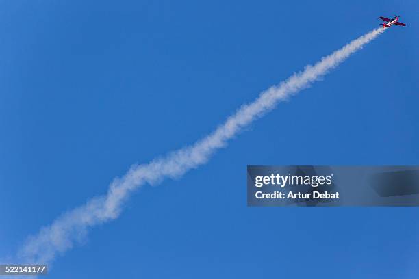 Smoke Flying Smoke Trails Plane Photos and Premium High Res Pictures - Getty Images