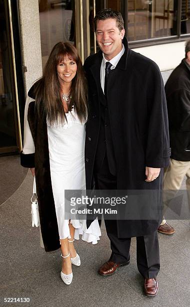 Actress Linda Lusardi with her husband actor Sam Kane arrive at the "Norman At Ninety" Tribute Luncheon at the Royal Lancaster Hotel on February 18,...