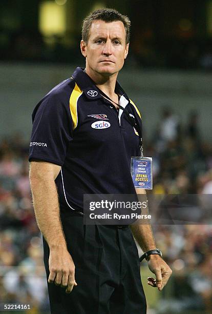 John Worsfold, coach of the Eagles looks on during the round one AFL Wizard Cup match between the Fremantle Dockers and the West Coast Eagles at...