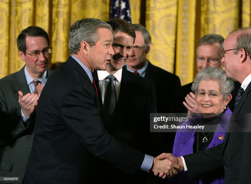Signing Rfs W. Bush U.S. President George W. Bush greets invited guests after signing the ...