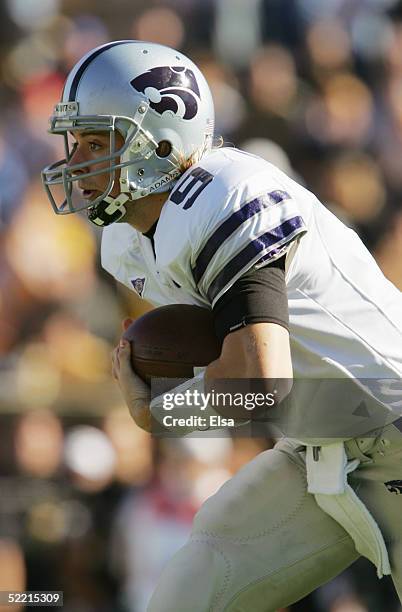 Quarterback Dylan Meier of the Kansas State University Wildcats scrambles with the ball against the University of Missouri Tigers during the game on...