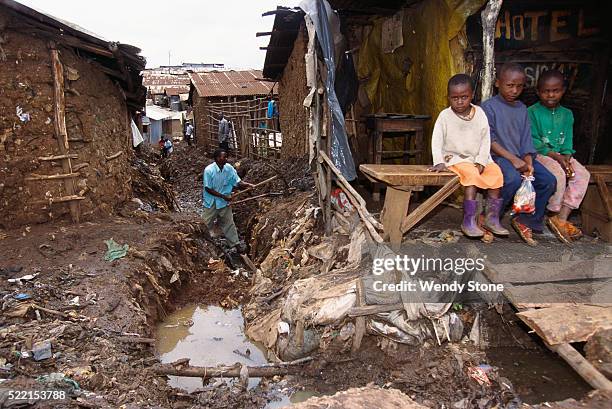 preparing to dig a new sewer - slum stock pictures, royalty-free photos & images