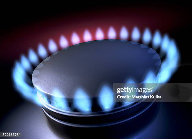 natural gas burner flame - gasherd stock-fotos und bilder