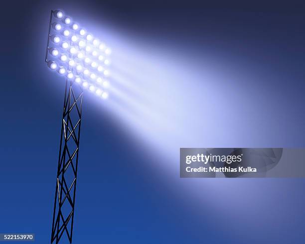 floodlight at twilight - flutlicht stock-fotos und bilder