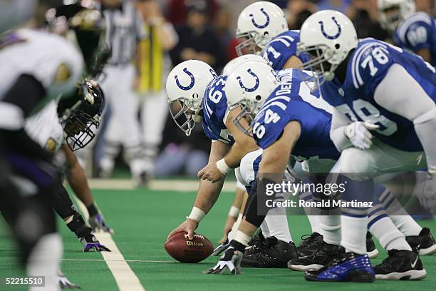 Indianapolis Colts offensive linemen Jeff Saturday, Rick DeMulling, and Tarik Glenn face the Baltimore Ravens on December 19, 2004 at the RCA Dome in...