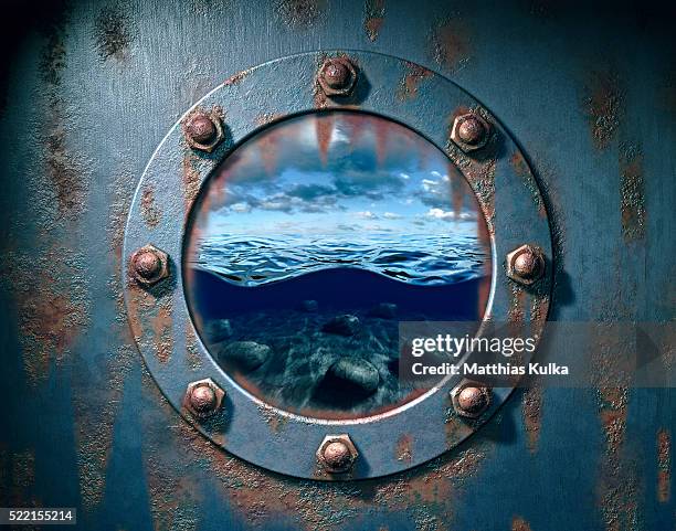window to tranquil sea - patrijspoort stockfoto's en -beelden