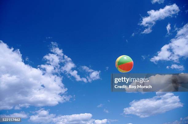 beach ball in the air - beach ball stock pictures, royalty-free photos & images
