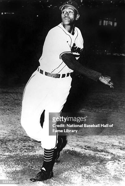 Satchel Paige of the Cleveland Indians warms up before a game. Leroy Robert Paige pitched for the Indians in 1948 and 1949.