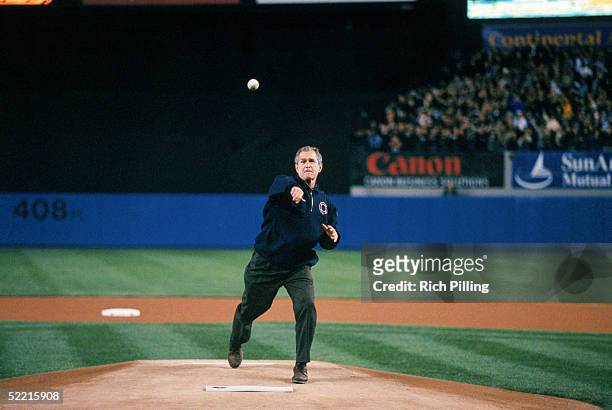 President George W. Bush throws out the ceremonial first pitch before Game Three of the 2001 World Series between the Arizona Diamondbacks and the...