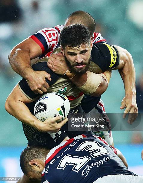 Josh Mansour of the Panthers is tackled during the round seven NRL match between the Sydney Roosters and the Penrith Panthers at Allianz Stadium on...