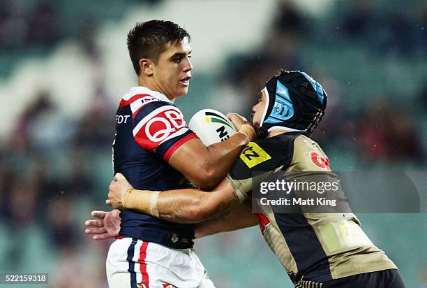 Jayden Nikorima of the Roosters is tackled by Jamie Soward of the Panthers during the round seven NRL match between the Sydney Roosters and the...