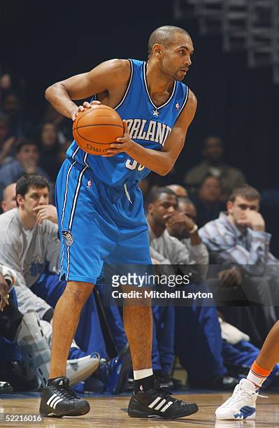Grant Hill of the Orlando Magic looks to pass during the game with the Washington Wizards January 29, 2005 at the MCI Center in Washington DC. The...