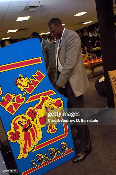 Sophomore Team coach Bob McAdoo plays a game of Ms. Pac-Man in the locker room prior to the got milk? Rookie Challenge during 2005 NBA All-Star...