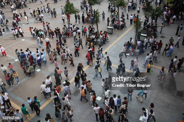 china, guangdong province, guangzhou, xiajiu lu pedestrian street, crowd of people - population explosion stock pictures, royalty-free photos & images