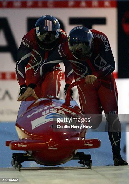 The USA I team of Steven Holcomb and Pavle Jovanovic push off at the start in a training run during FIBT 2005 Bobsleigh Men's World Championships at...