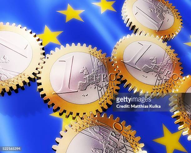 euro coins as gears - la comunità europea foto e immagini stock