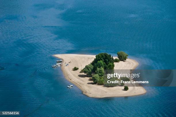 netherlands, tolkamer, little island in lake - island foto e immagini stock