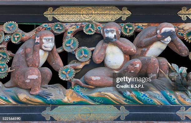 allegorical wooden relief at toshogu shrine in nikko, japan - nikko stock-fotos und bilder