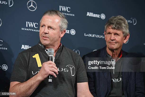 Laureus World Sports Academy member Sean Fitzpatrick speaks as Laureus World Sports Academy member Morne du Plessis looks on during a Rugby Press...