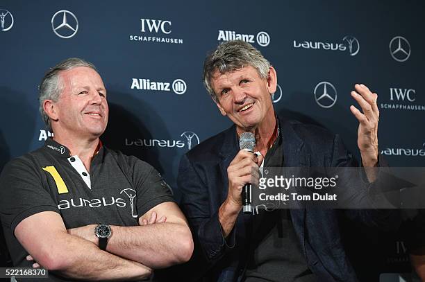 Laureus World Sports Academy member Morne du Plessis speaks as Laureus World Sports Academy member Sean Fitzpatrick looks on during a Rugby Press...