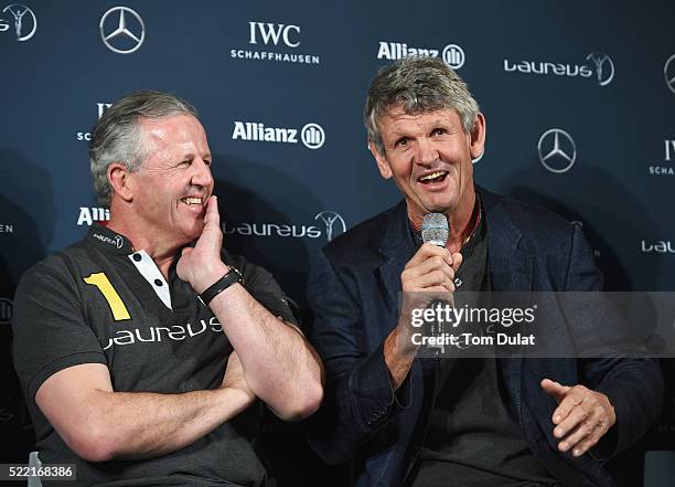 Laureus World Sports Academy member Morne du Plessis speaks as Laureus World Sports Academy member Sean Fitzpatrick looks on during a Rugby Press...