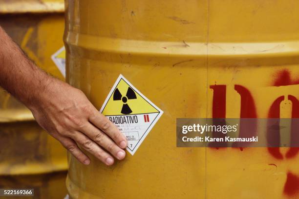 barrel containing radioactive waste - radioactive warning symbol stock pictures, royalty-free photos & images
