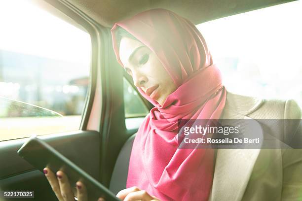 business woman in a taxi - turk telekom bildbanksfoton och bilder