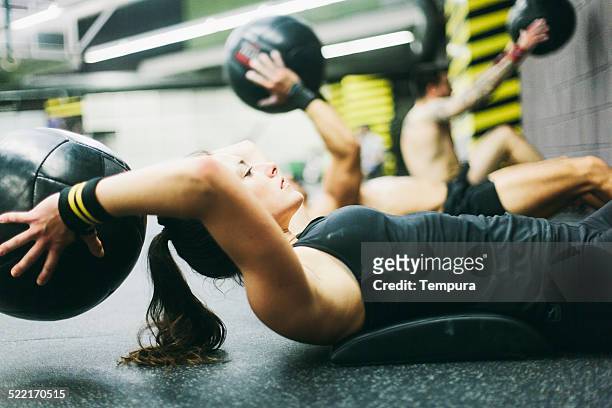 young woman in high intensity fitness session. - effort stock pictures, royalty-free photos & images