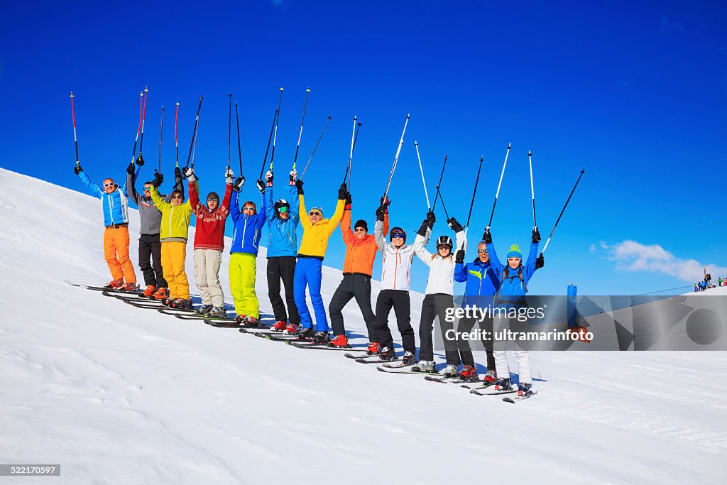Ski club school skiing trips   Colorful group of snow skiers
