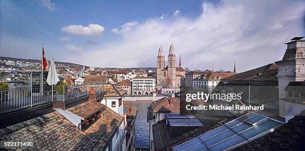 zurich rooftops - grossmunster cathedral stock pictures, royalty-free photos & images