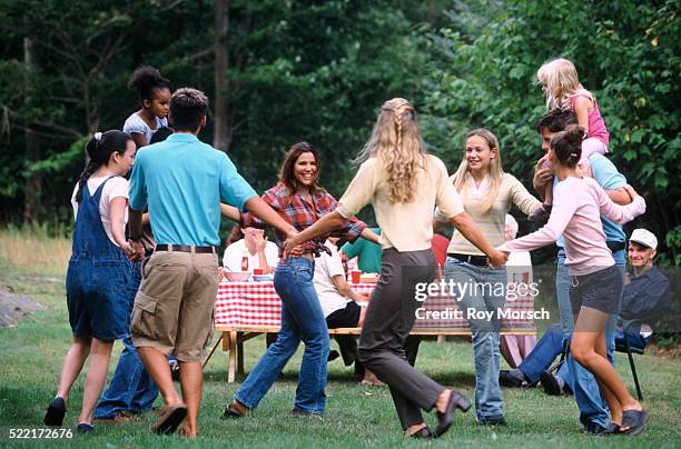 having fun at family reunion - vintage funny black and white stock-fotos und bilder