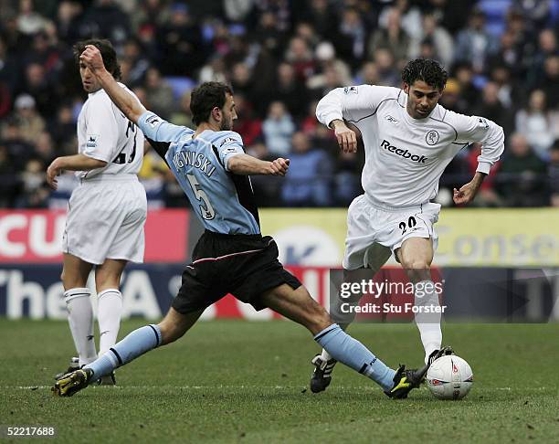 Fernando Hierro of Bolton is felled by Sylvian Legwinski of Fulham during the Fifth Round FA Cup match between Bolton Wanderers and Fulham at The...