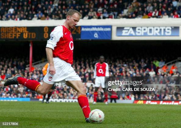 Arsenal's Dennis Bergkamp takes a shot a Arsenal's Dennis Bergkamp takes a shot a