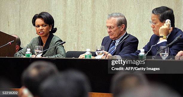 Secretary of State Condoleezza Rice , accompanied by US Secretary of Defense Donald Rumsfeld and Japanese Foreign Minister Nobutaka Machimura, speaks...