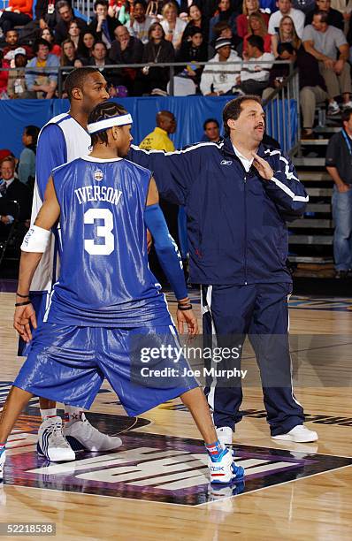 Stan Van Gundy, head coach of the East All-Stars instructs Gilbert Arenas of the Washington Wizards and Allen Iverson of the Philadelphia 76ers...