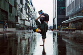 Handstand dancer in the street, teenage dancer