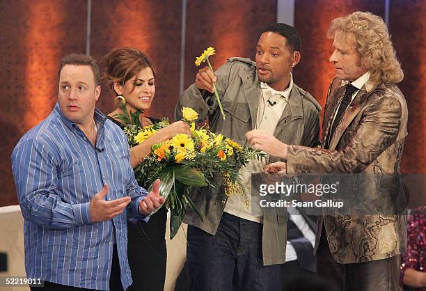 Actor Kevin James, actress Eva Mendes, actor Will Smith and host Thomas Gottschalk clown on the "Wetten Dass...?" television entertainment show at...