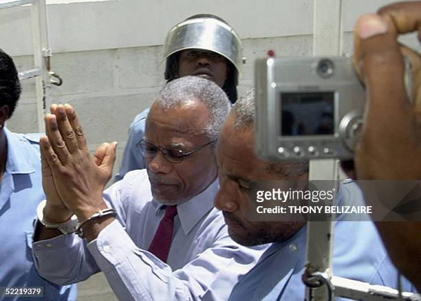 Photo dated 16 July 2004 of former Haitian prime minister Yvon Neptune arriving at court in Port-au-Prince for a hearing on charges of human rights...