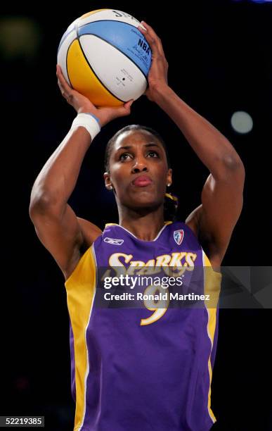 Lisa Leslie of the Los Angeles Sparks, playing for the Los Angeles team, shoots in the Radio Shack Shooting Stars contest, part of 2005 NBA All-Star...