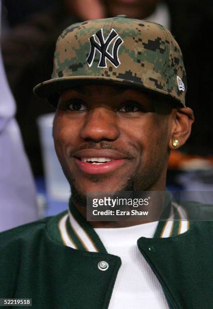 LeBron James of the Cleveland Cavaliers watches the Foot Locker Three-Point Shootout, part of 2005 NBA All-Star Weekend at Pepsi Center on February...