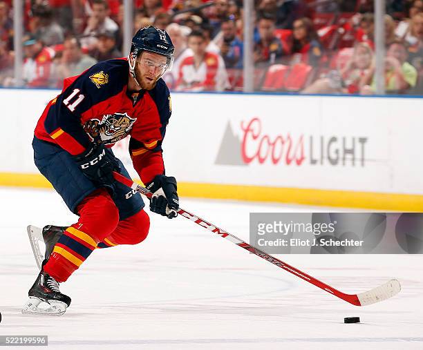 Jonathan Huberdeau of the Florida Panthers skates with the puck against the New York Islanders in Game One of the Eastern Conference Quarterfinals...