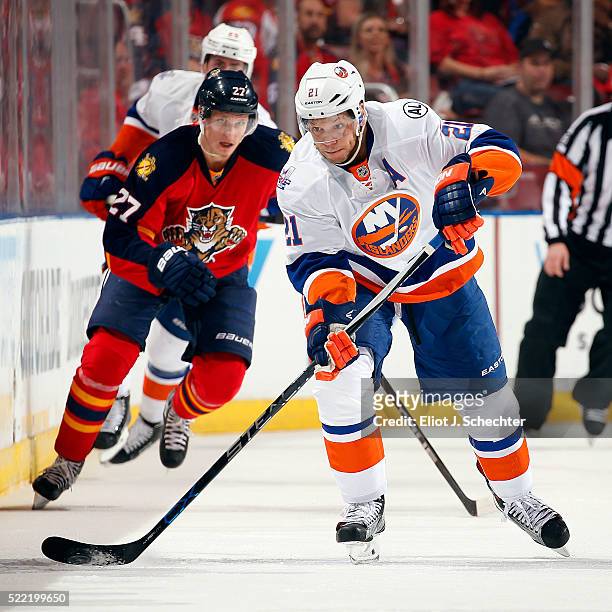 Kyle Okposo of the New York Islanders skates with the puck against the Florida Panthers in Game One of the Eastern Conference Quarterfinals during...
