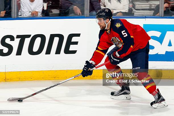 Aaron Ekblad of the Florida Panthers skates with the puck against the New York Islanders in Game One of the Eastern Conference Quarterfinals during...