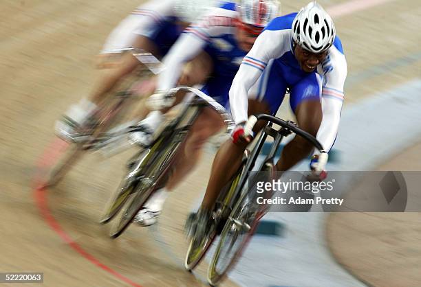 Gregory Bauge, Arnaud Tournant and Francois Pervis of France on their way to Gold in the Men's Team Sprint during day three of the UCI Track Cycling...