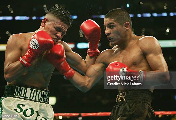 Francisco Soto is hit with a right uppercut by Abner Mares during their bantemweight fight on February 19, 2005 at the Staples Center in Los Angeles,...