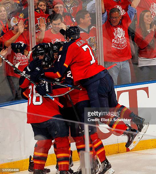 Reilly Smith of the Florida Panthers celebrates his goal with teammates against the New York Islanders in Game One of the Eastern Conference...