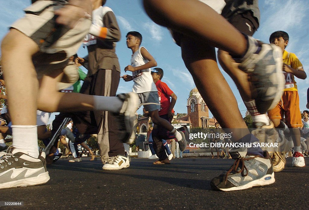 Indian runners take part in a marathon o