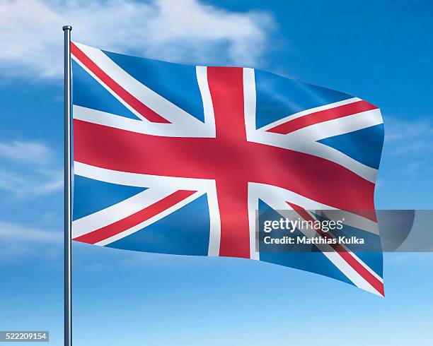 british flag against cloudy sky - asta fotografías e imágenes de stock